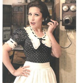 Postcard with image of a housewife talking on an old-fashioned telephone. Text "Come to the Museum" 6755 Newlin Ave., Whittier, California 90601 www.whittiermuseum.org