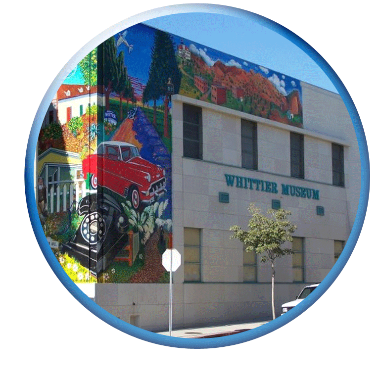 photo of the front of the Whittier Museum showing the mural with Whittier sites