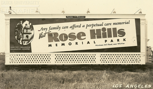 old billboard advertising Rose Hills Cemetery