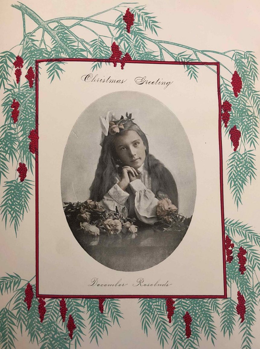 Graphic from the Whittier State School publication, Whittier Boys and Girls Magazine showing a girl with surrounded by flowers and the words "Christmas Greeting, December Rosebuds". The background is an illustration of pepper tree branches with red berries hanging from them.