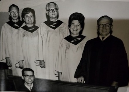 photo of Dr. Francis Baxter at right, organist Thomas Strout at bottom and members of the choir circa late 1960s.